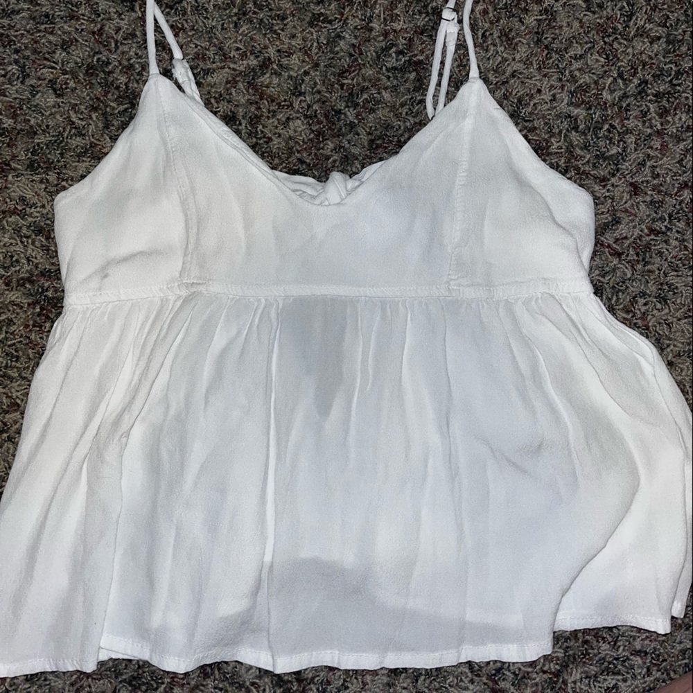 Brandy Melville tie back white tank top. Size: S. Worn a couple times